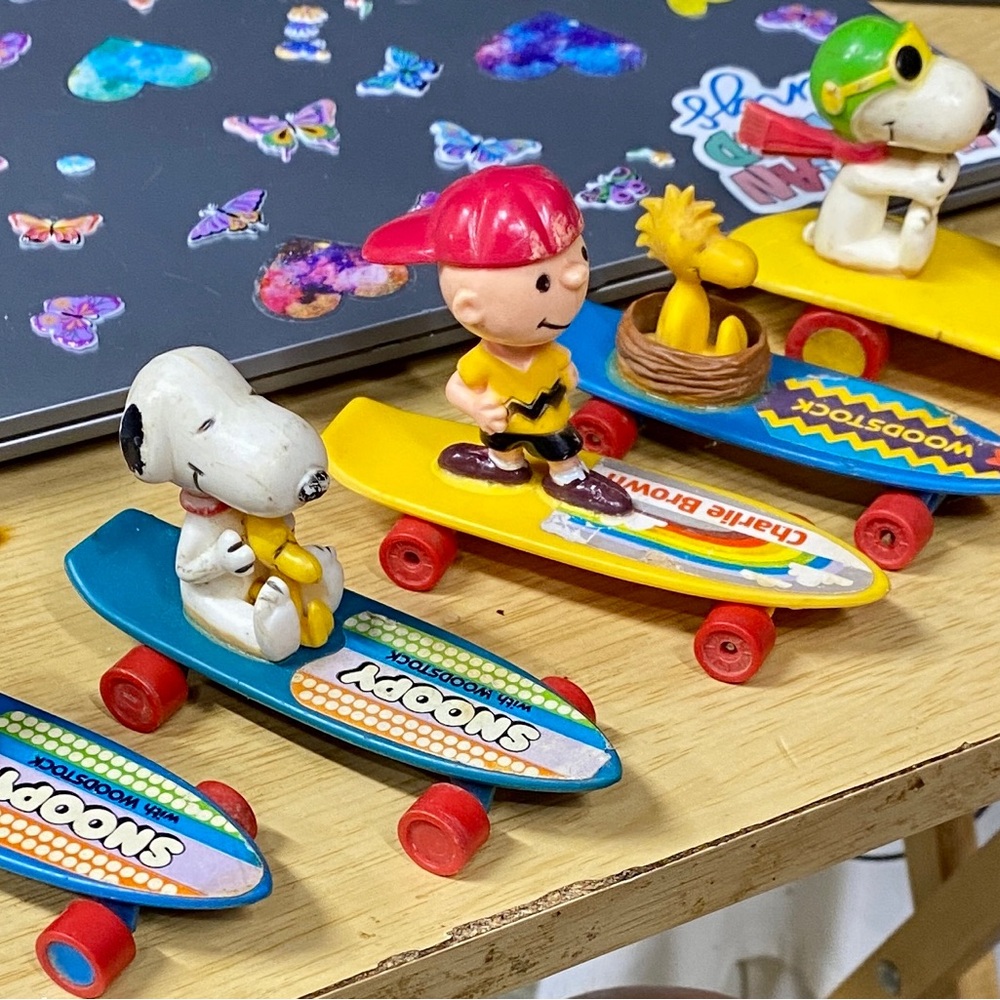Peanuts Skateboard Adventure Figures - Blue, Yellow, Red
